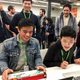 Fans at the Facebook meet up having a quick typing speed test. (Image: Alex Cranz/Gizmodo)